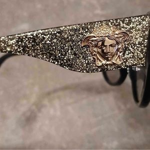 Vintage Versace sunglasses with original case. Never worn.